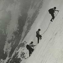 People climbing in snow