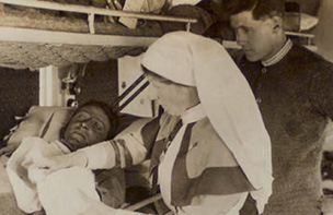 Nurse tending a wounded soldier on a hospital train