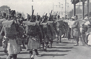 Marching kilted soldiers