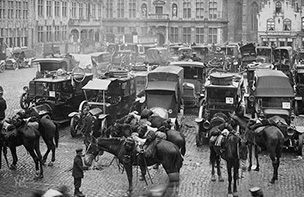 Horse and ambulances in a town square