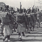 Kilted troops marching