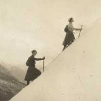 Two women climbing