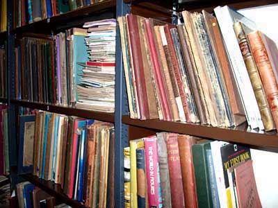 Books and papers on shelves