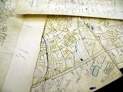 Maps with handwritten lines and comments