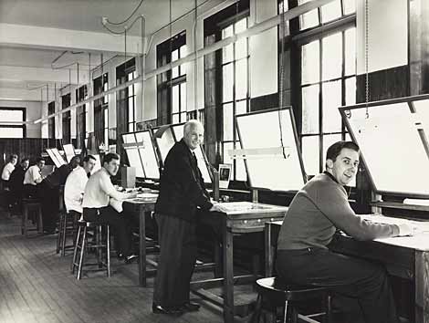 Photo of litho artists looking at camera