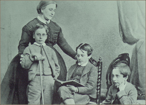 Photo of a woman and three boys