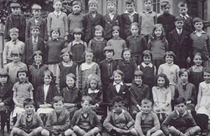 Group of primary school boys and girls, 1930s