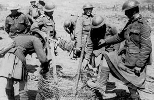 Gordon Highlanders preparing barbed-wire defences  