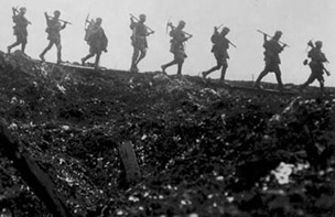 A row of soldiers carrying picks and shovels