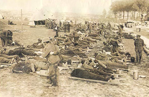 'Soldiers lying on stretchers