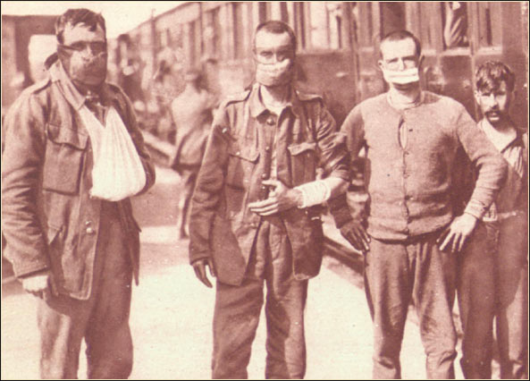 Soldiers wearing cloths of mouths and noses as early gas masks
