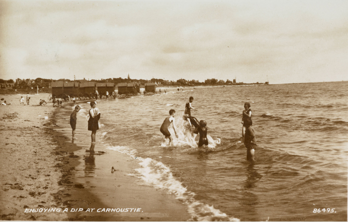 Photograph of people bathing in the sea at Carnoustie, 1901.