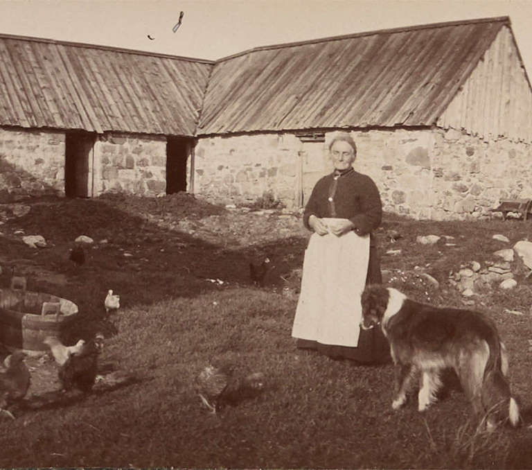 Photograph of a woman on a farm