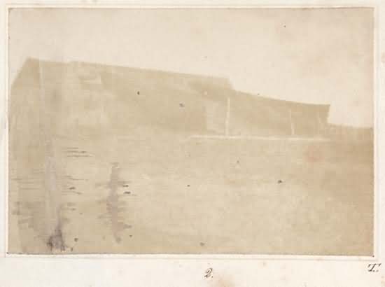 Pleasure boat belonging to Ronald, and fishing boat (Dickie's) hauled at Maitland's Sheds. Location unidentified, but possibly Fairlie, Ayrshire.
